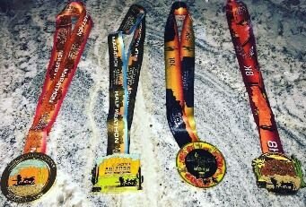 8K Trail finisher medal - 2027 design coming soon